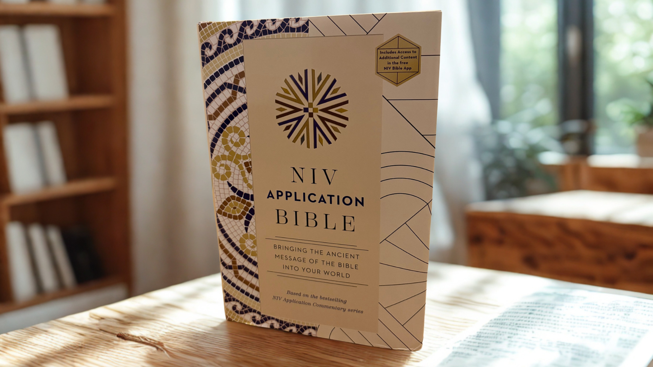NIV Application Bible with blue and gold mosaic pattern cover by Zondervan