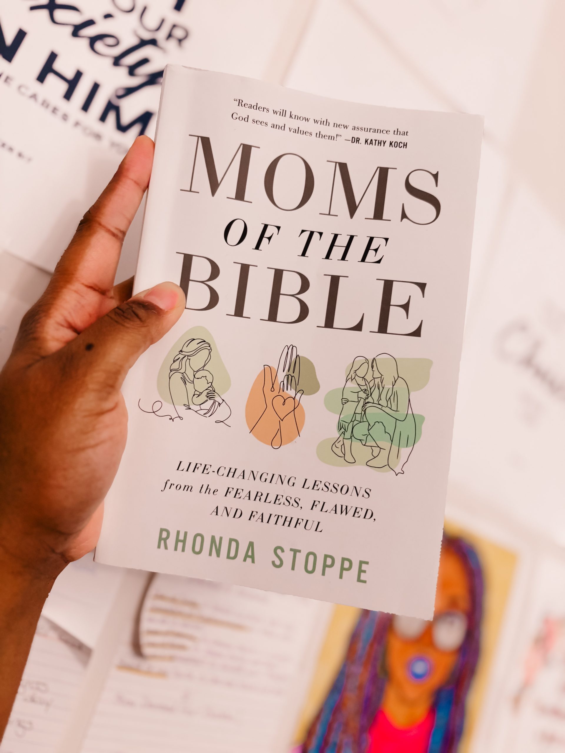 Book reviewer, Priscilla holding Uncomplicate It