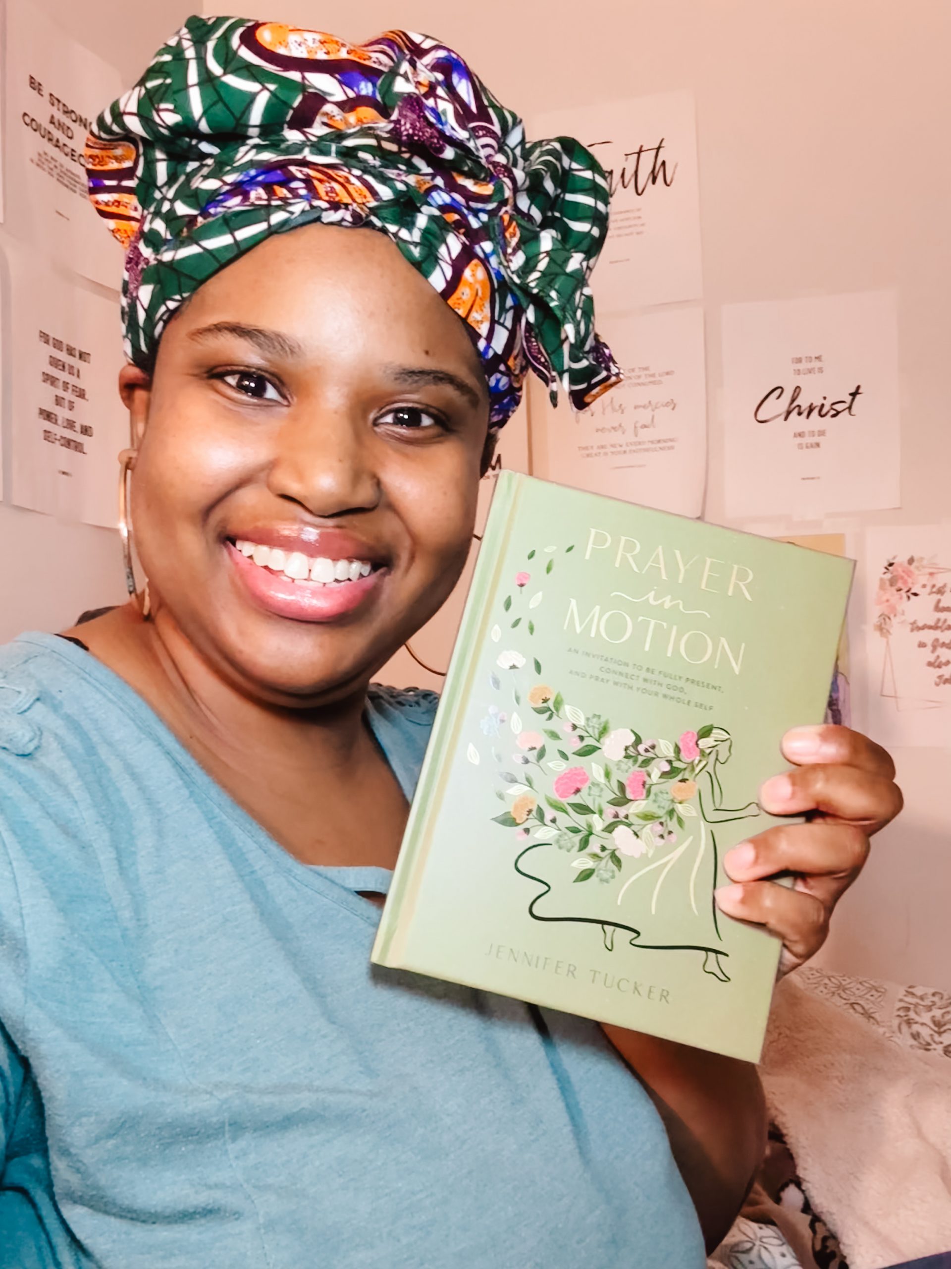 Book reviewer, Priscilla holding Uncomplicate It